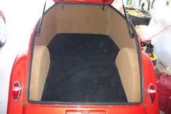 COMPLETELY CARPETED INTERIOR IN THE ROADSTER TRAILER